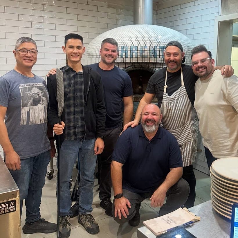The Central Coast crew at Sorrento Pizzeria's wood-fired oven, Empire Bay
